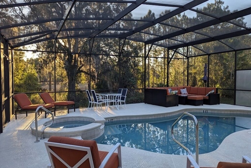Family enjoying a private screened pool at a Florida villa