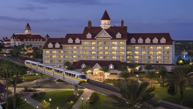 Premium Orlando hotel resort lit up at dusk